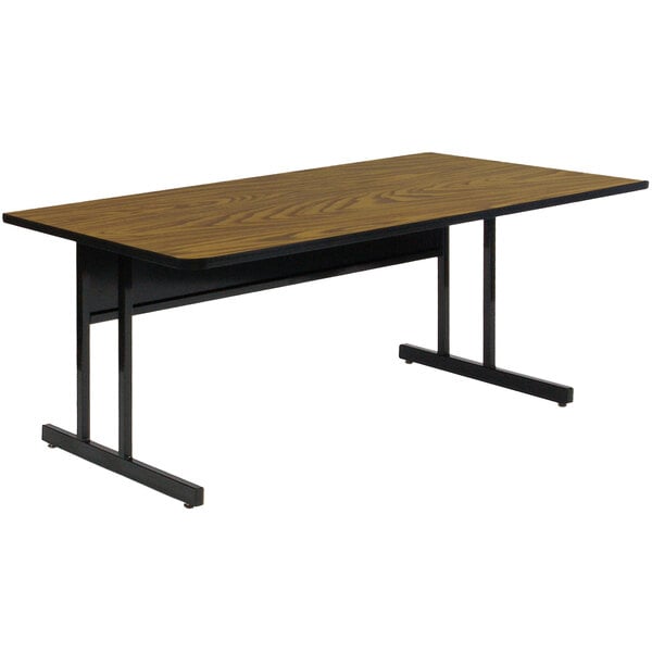 A brown rectangular table with black legs.