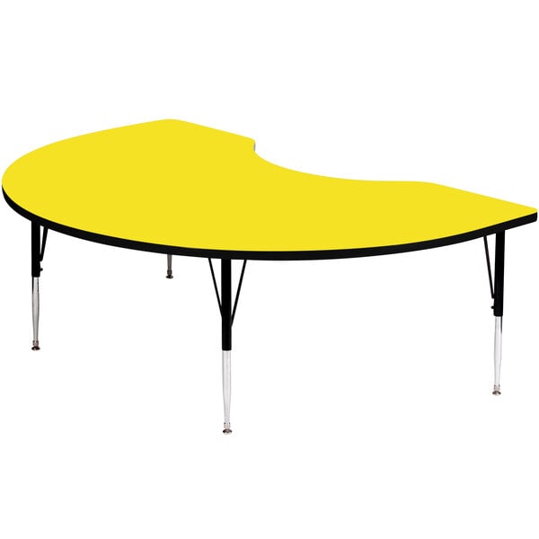 a yellow table with black legs