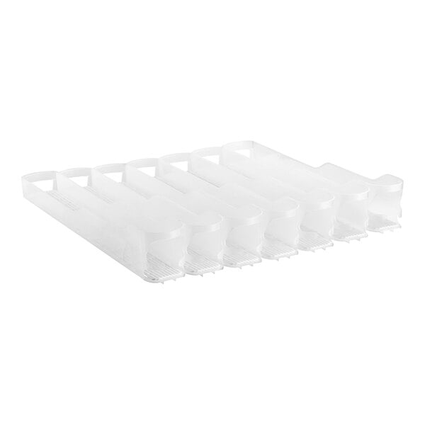 A clear plastic tray with seven lanes.
