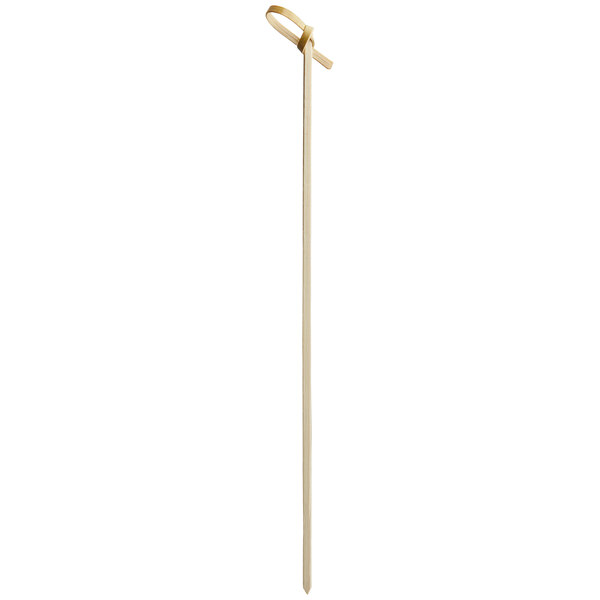 A wooden bamboo food pick with a knot at the top.
