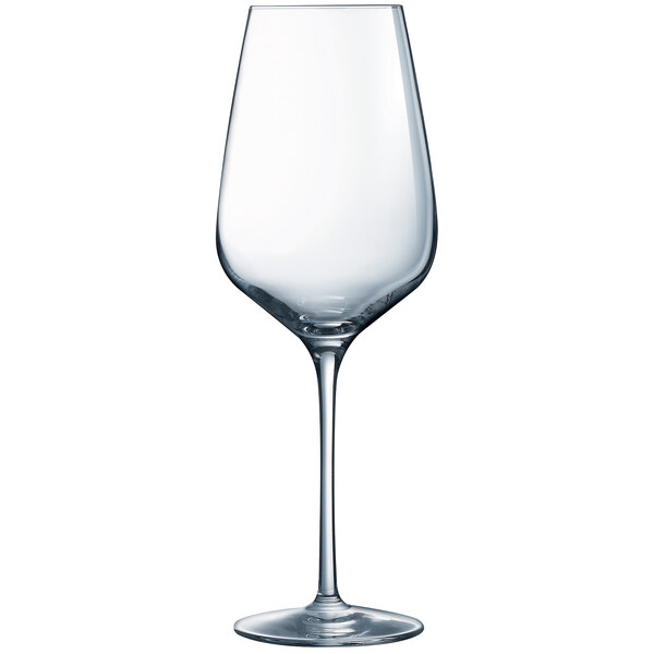 A close-up of a clear Chef & Sommelier wine glass with a long stem.