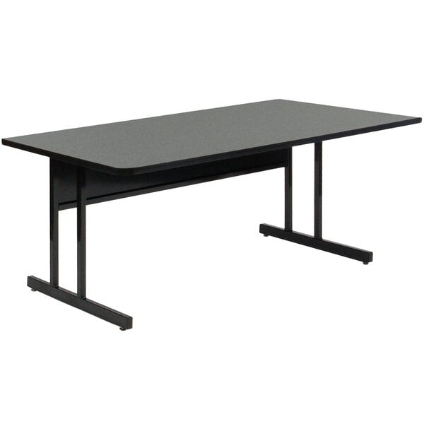 A black rectangular Correll computer table with metal legs and a Montana granite top.