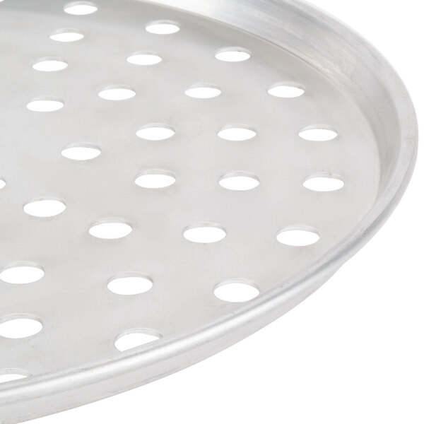 An American Metalcraft aluminum pizza pan with perforations.