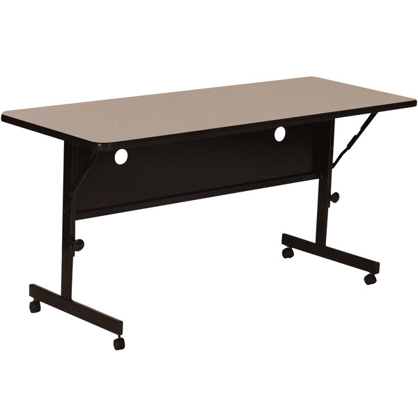 A rectangular Correll Savannah Sand seminar table with wheels.