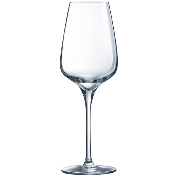 A clear wine glass with a stem.