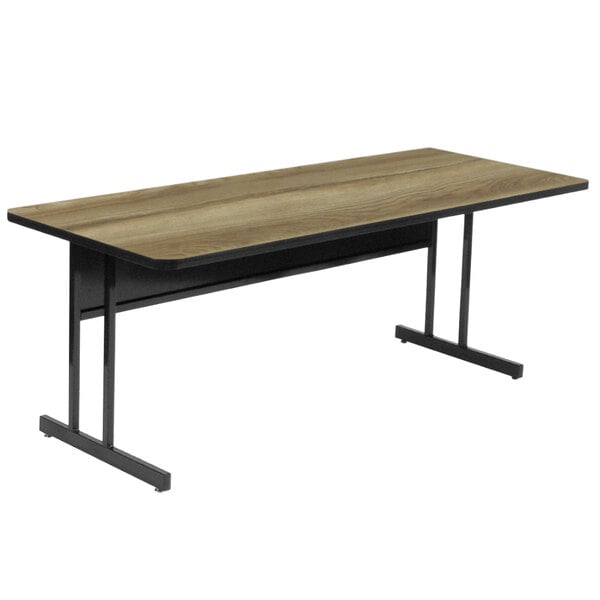 a wooden desk with black metal legs