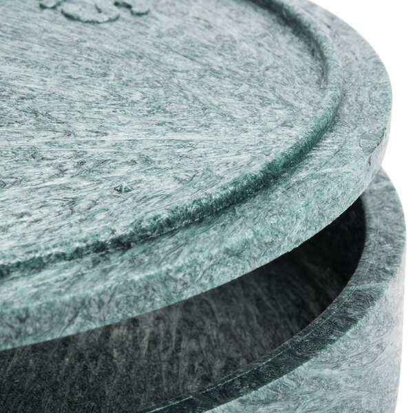 A green and black marbled polyethylene tortilla server with a lid.