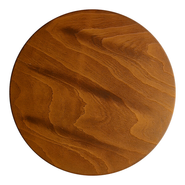 A Lancaster Table & Seating bar stool with a rustic walnut finish seat.