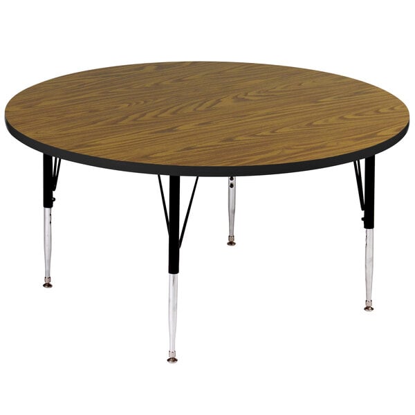 A Correll round activity table with adjustable legs.