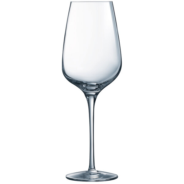 A close-up of a clear Chef & Sommelier wine glass with a long stem.