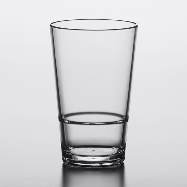 A close-up of a clear Libbey Tritan plastic mixing glass with a clear rim.