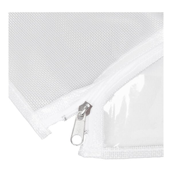 A close-up of a white mesh and clear plastic material with a zipper, likely part of a protective cover.