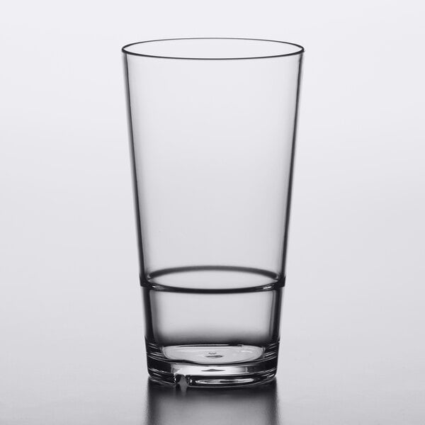 A close-up of a clear Libbey Tritan plastic mixing glass with a clear rim.