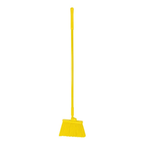 A yellow broom with a yellow handle.