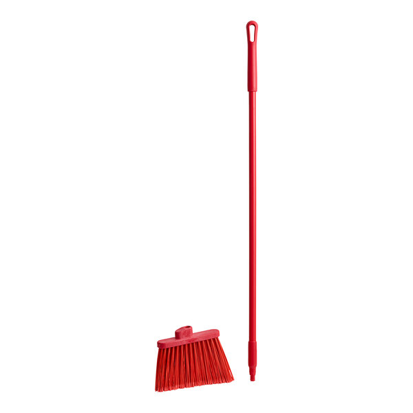 A red Carlisle Sparta Duo-Sweep broom with a red handle.