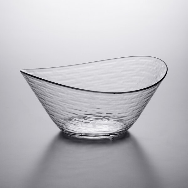 A clear plastic oval bowl with a curved edge.