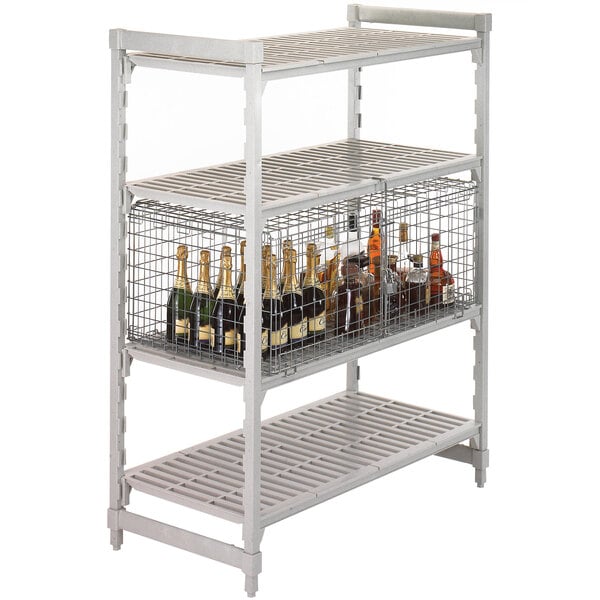 A white metal Cambro Camshelving® security shelf with bottles on it.