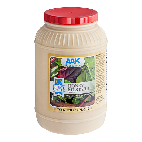 A white jar of AAK Select Recipe honey mustard dressing with a red lid and label.