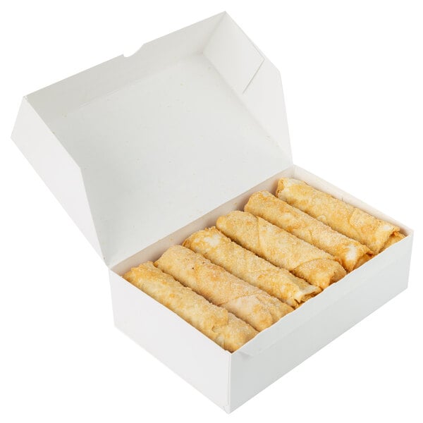A box of Minh Vegetable Egg Rolls on a table.