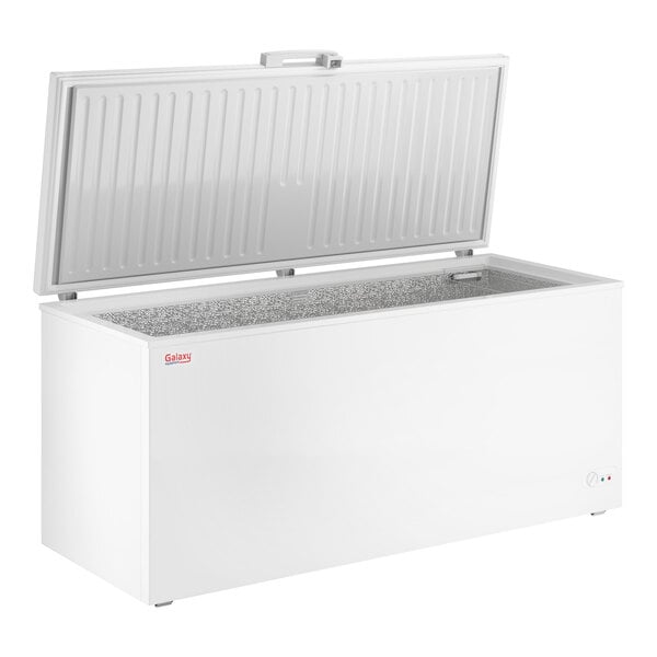 A large white commercial chest freezer with an open top lid and a 19.4 cubic foot capacity.