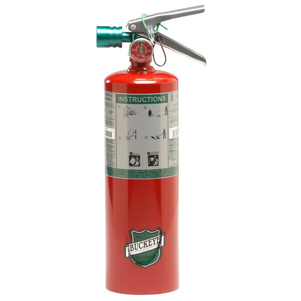 A close-up of a Buckeye Halotron fire extinguisher can with a green handle.