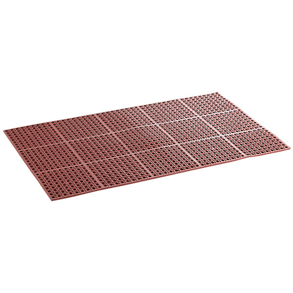 A red rectangular Lavex rubber anti-fatigue floor mat with holes.