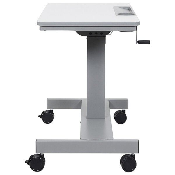 A light gray Luxor standing desk with a crank adjustable height and gray steel frame.