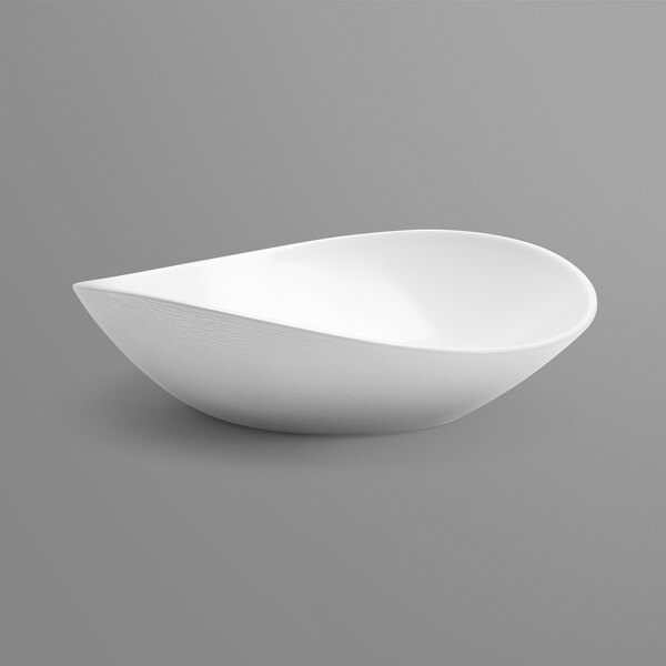 a white bowl on a gray background