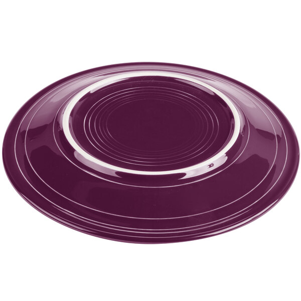 A purple Fiesta dinner plate with a white rim.