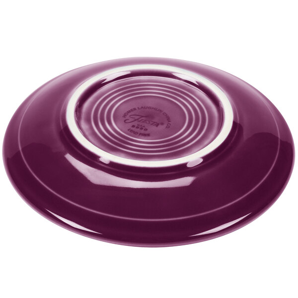 A purple Fiesta saucer with a white rim.
