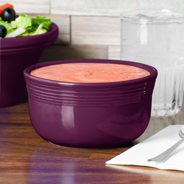 A close-up of a purple Fiesta Gusto Bowl with salad.