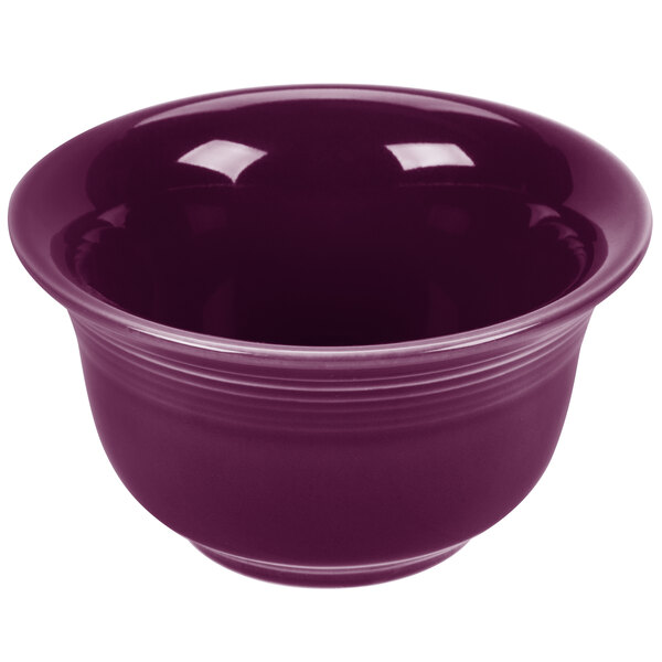a purple bowl with a white background