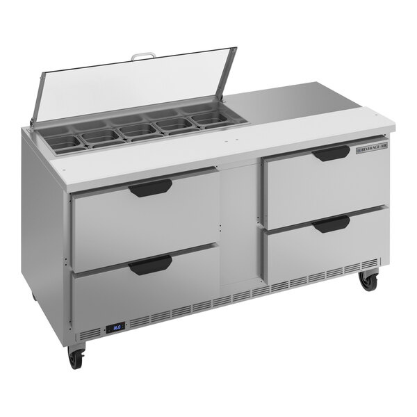 A Beverage-Air stainless steel 4 drawer refrigerated sandwich prep table with clear lids.