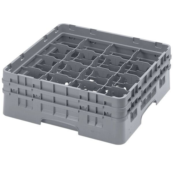 A soft gray plastic Cambro glass rack with 16 compartments and 2 extenders.