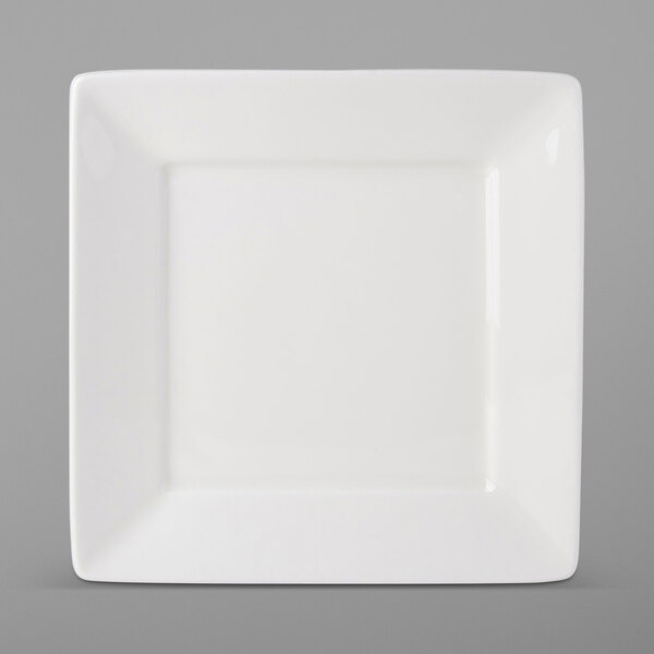 A white square Tuxton AlumaTux China plate with a white rim.