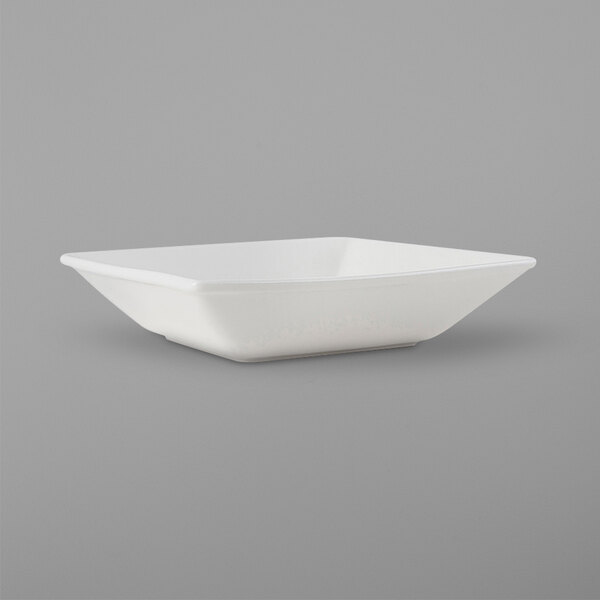 a white square bowl on a gray background