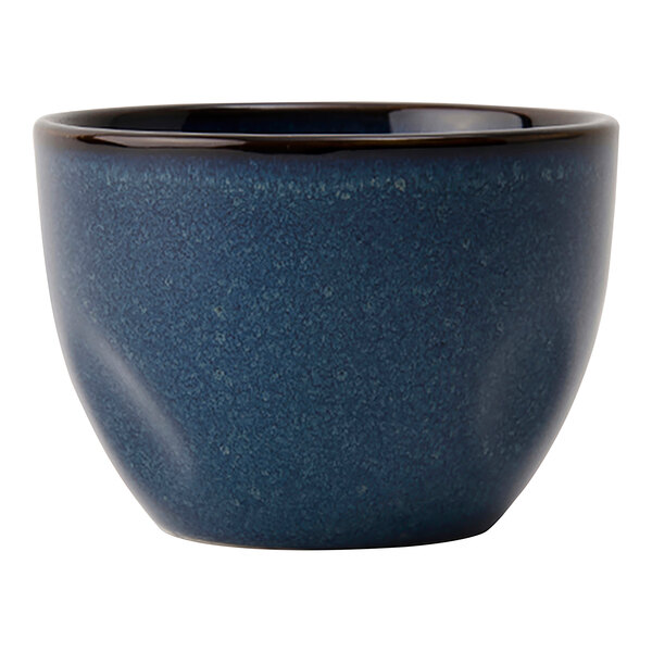 A blue Tuxton TuxTrendz bouillon cup with a black rim.