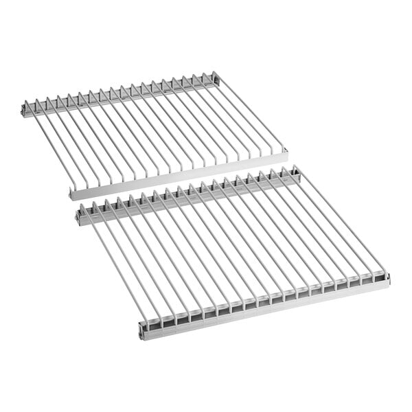 A pair of metal racks with a long handle.