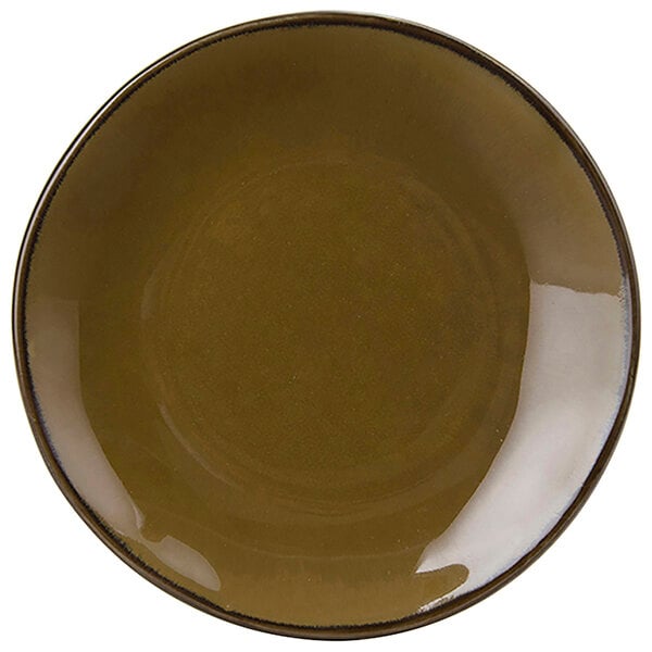 A close-up of a Tuxton Artisan Mojave China plate with a brown center and black rim.