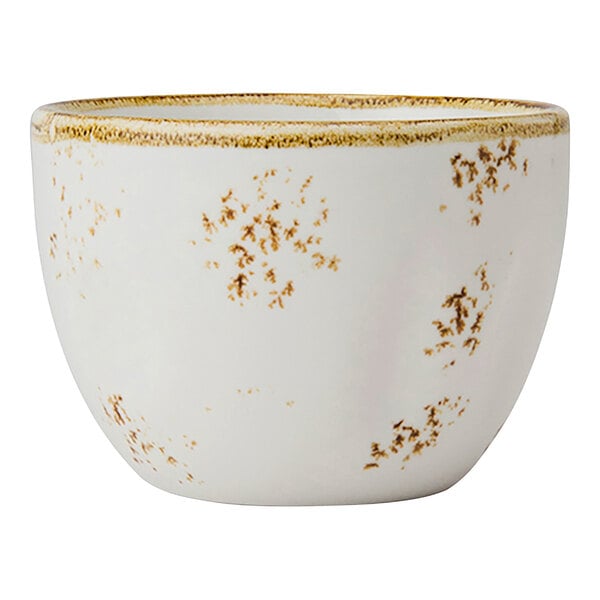 A white bouillon cup with brown and gold speckles.