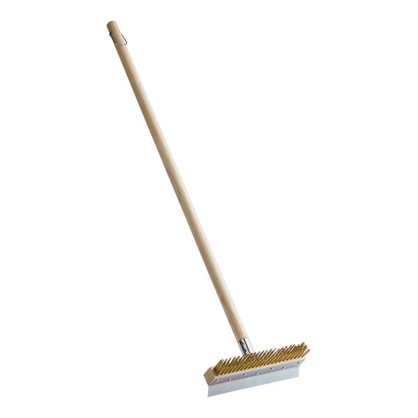 An American Metalcraft pizza oven brush with a wooden handle and metal scraper.
