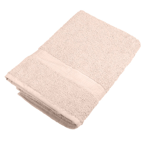 A close up of a beige Monarch Brands True Colors bath towel.