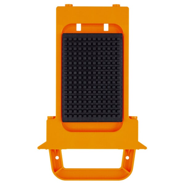 A black and orange rectangular Prince Castle Saber King dicer pusher head with a yellow border.