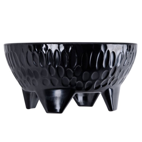 A black Viva Mexico melamine molcajete bowl with four legs.