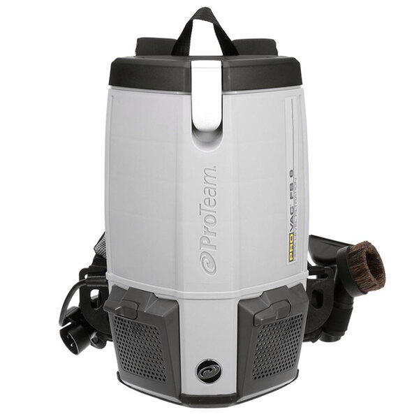A ProTeam ProVac FS6 backpack vacuum with a brush attached.