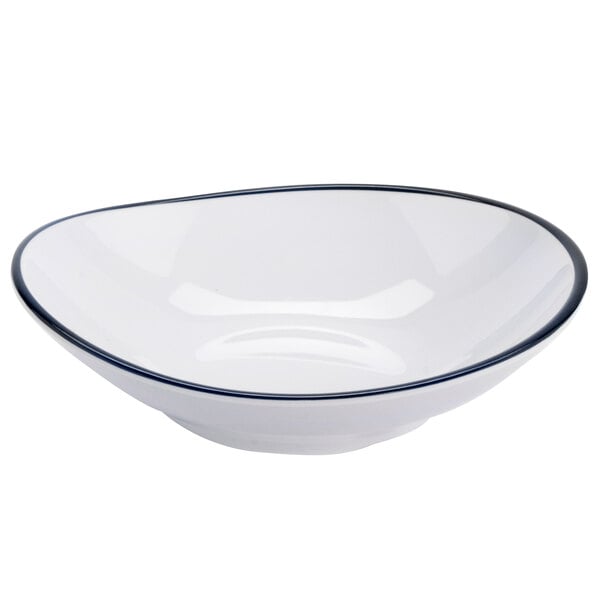 A white shallow bowl with black trim.