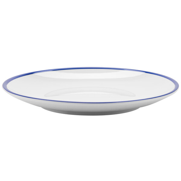 A white melamine coupe plate with a cobalt blue rim.