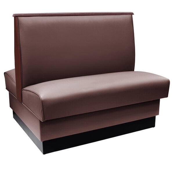 a brown leather chair with a black base