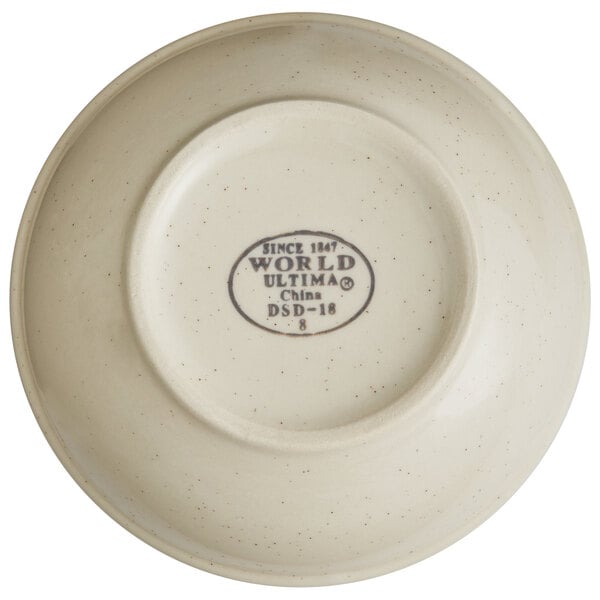 A white Libbey narrow rim stoneware bowl with a brown band and black text on the label.