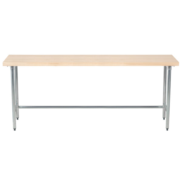An Advance Tabco wood top work table with a galvanized metal base.